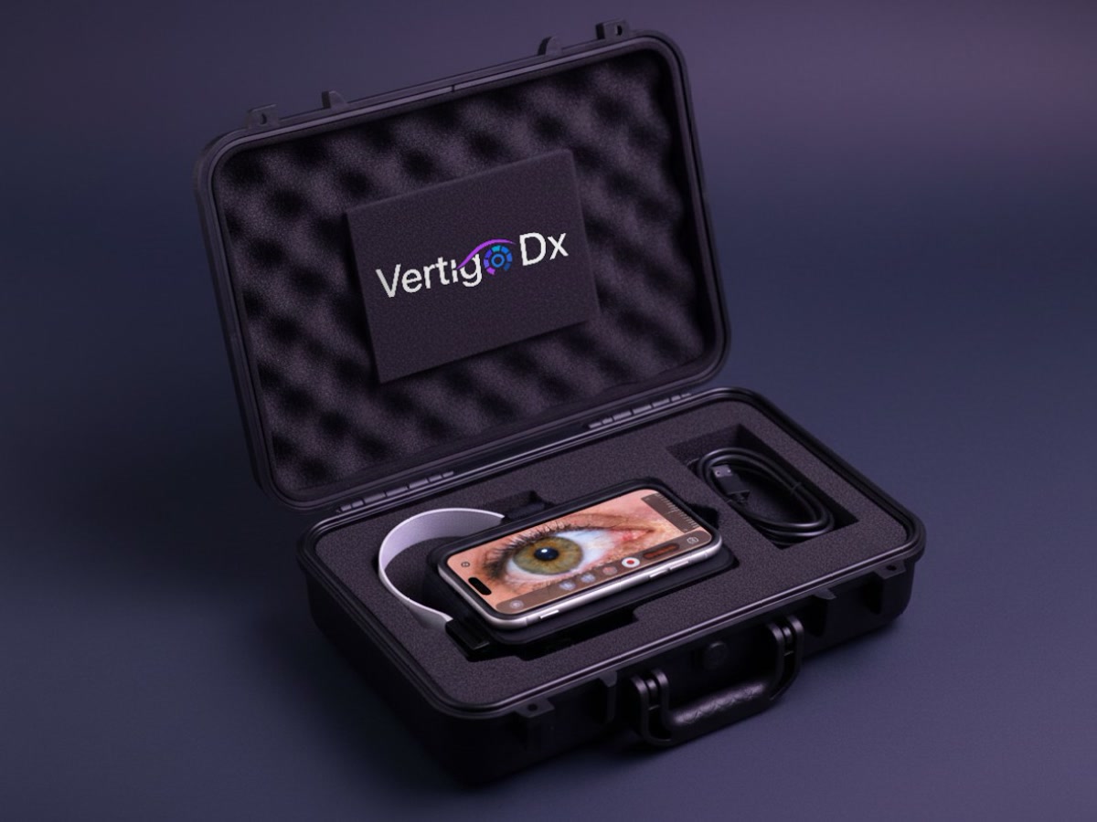 The SmartVertigo carry case open, the headset and phone inside